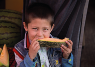 Boy with melon.